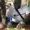 Tourists trying to make a Vietnamese pizza