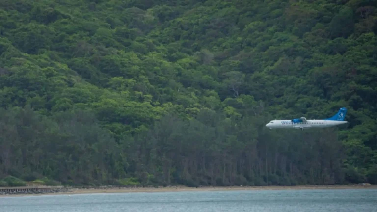 Aircraft landing near Vong Beach surrounded by Con Dao tropical forest