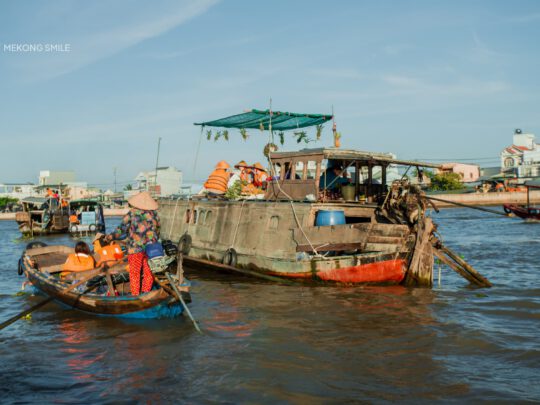 A view of the many boats filled with produce and goods at the bustling Cai Rang Floating Market.