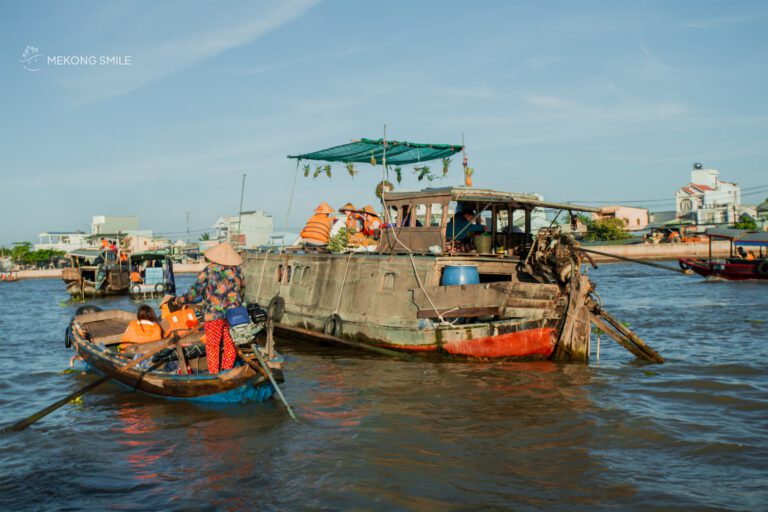 A view of the many boats filled with produce and goods at the bustling Cai Rang Floating Market.