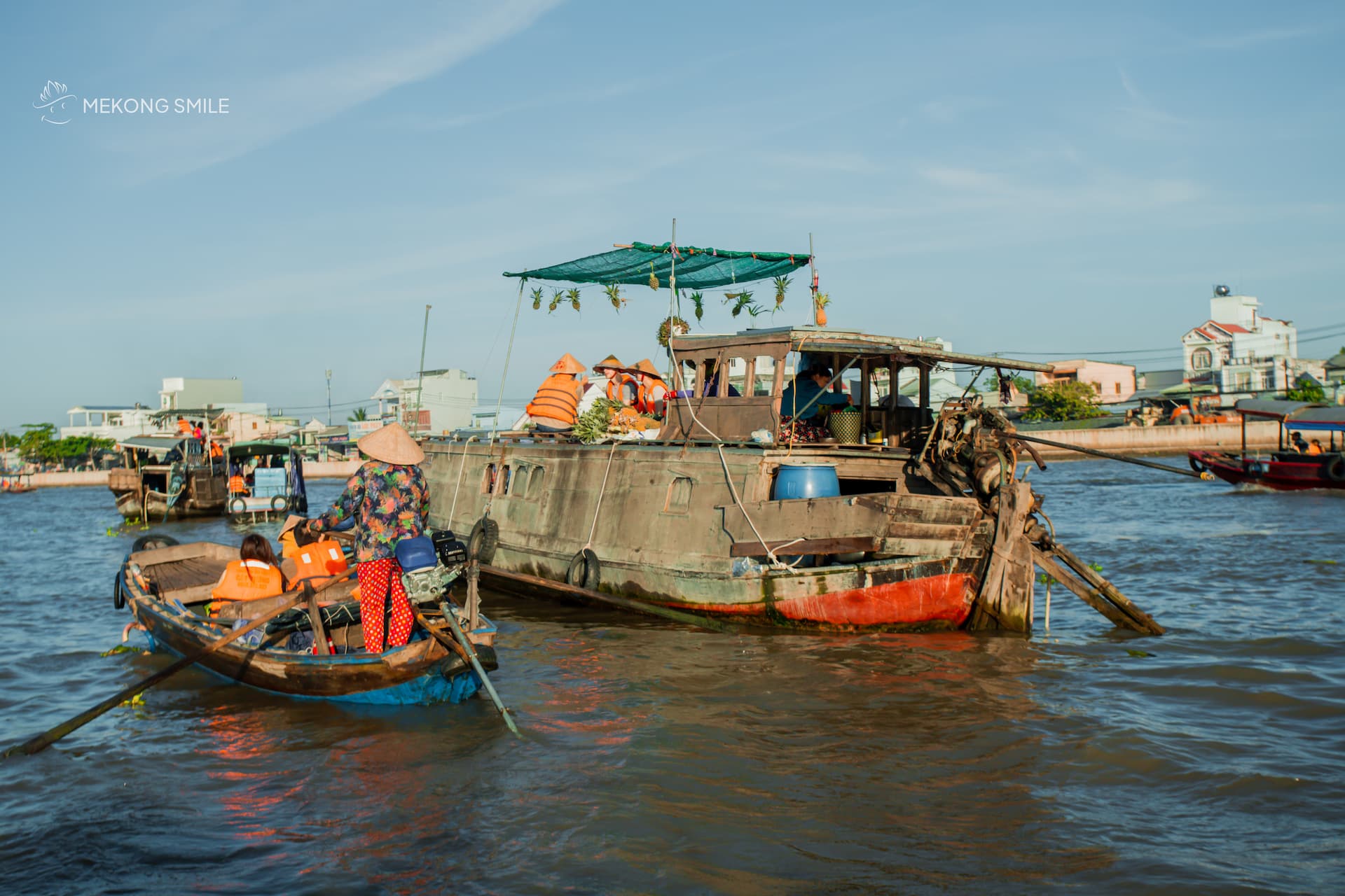 A view of the many boats filled with produce and goods at the bustling Cai Rang Floating Market.