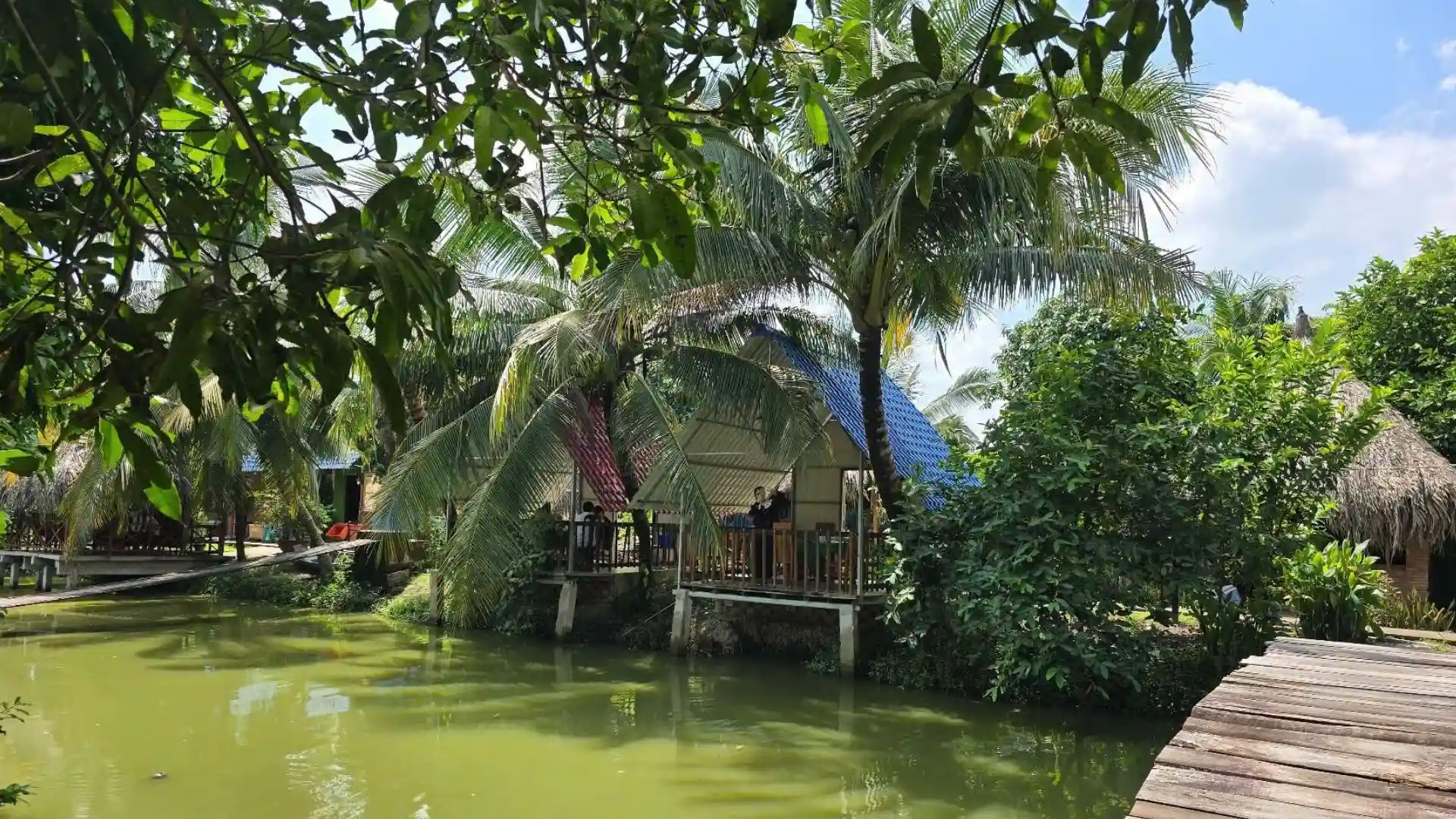 Lu Gia Xeo Nhum Ecological Garden: A Rustic Soul of Phong Dien 282 Traditional garden houses surrounded by tropical plants at Lu Gia Xeo Nhum Ecological Village