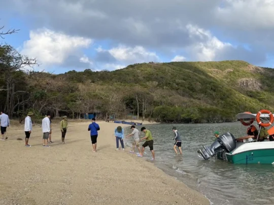 Travelers arriving by boat for an afternoon Ba Island nature and snorkeling trip