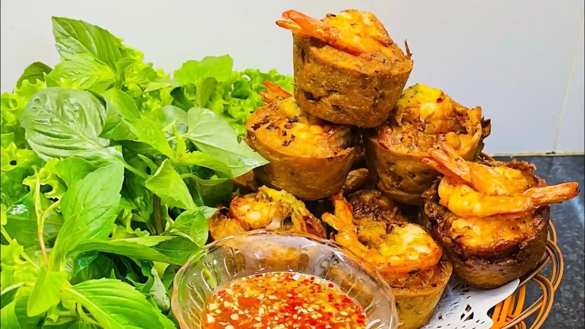 What to Eat in Vietnam: 30 Must-Try Dishes 99 Crispy bánh cống fritter served with fresh lettuce