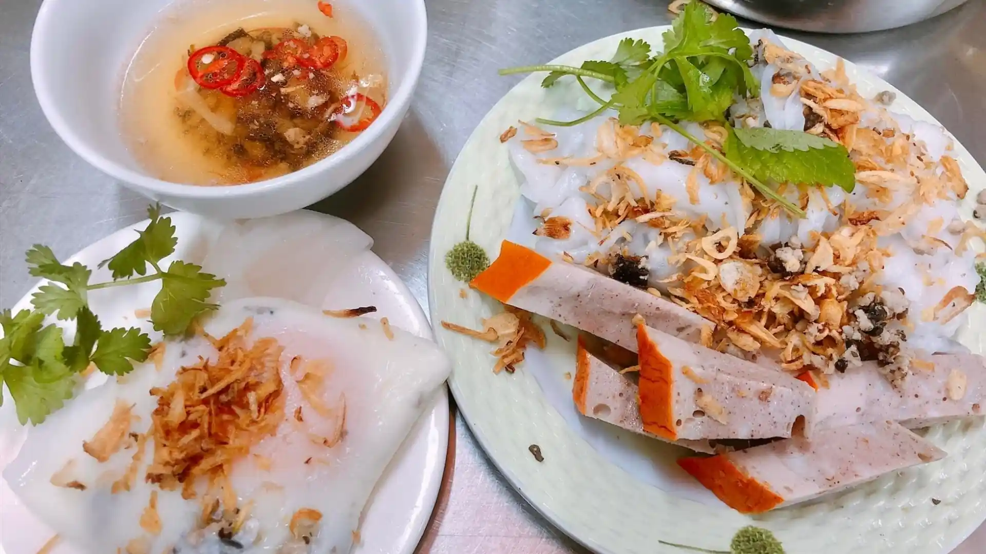 What to Eat in Vietnam: 30 Must-Try Dishes 81 Steamed bánh cuốn rice rolls with fried shallots and herbs