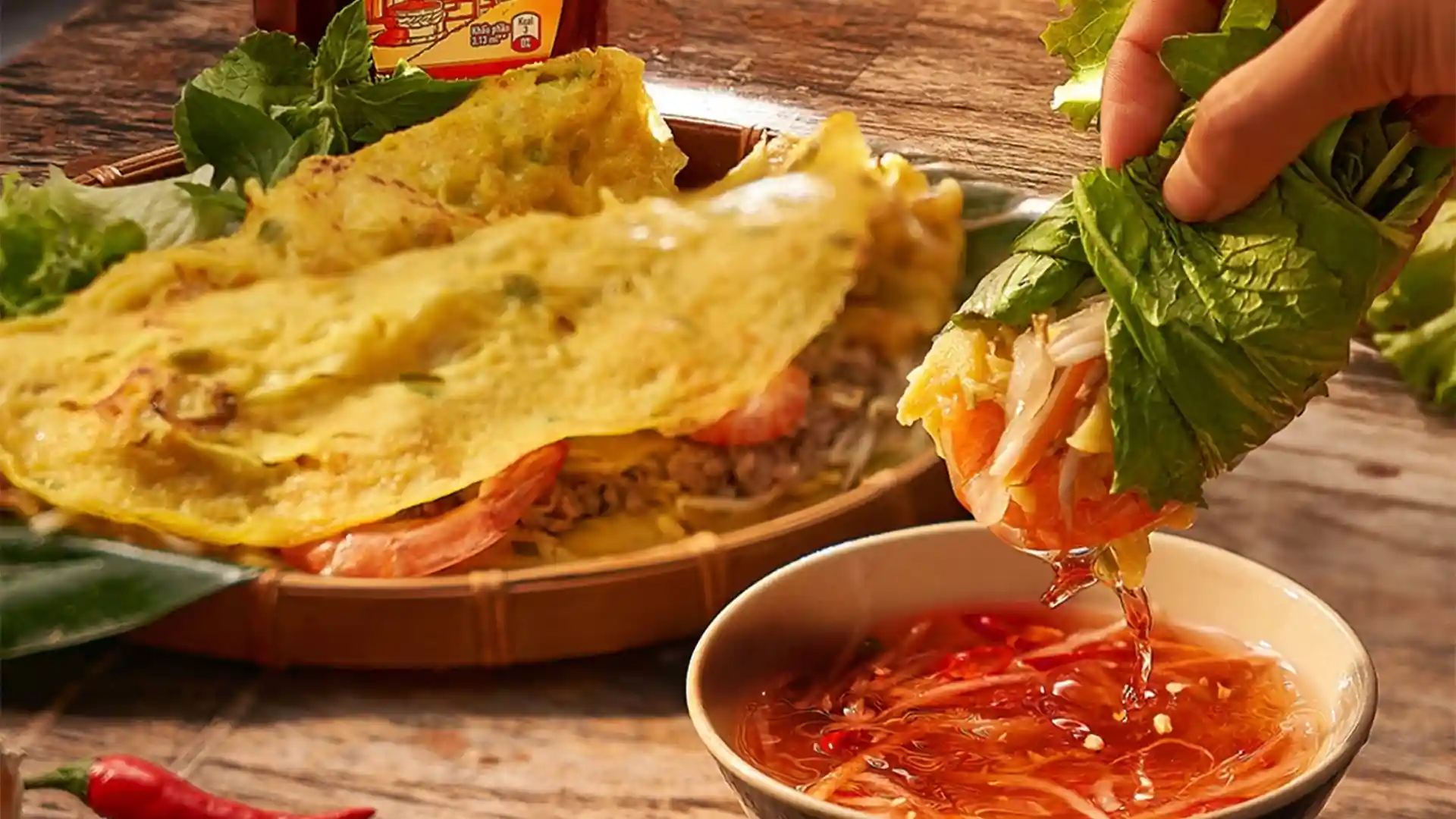 What to Eat in Vietnam: 30 Must-Try Dishes 96 Crispy bánh xèo pancake served with lettuce, herbs and dipping sauce