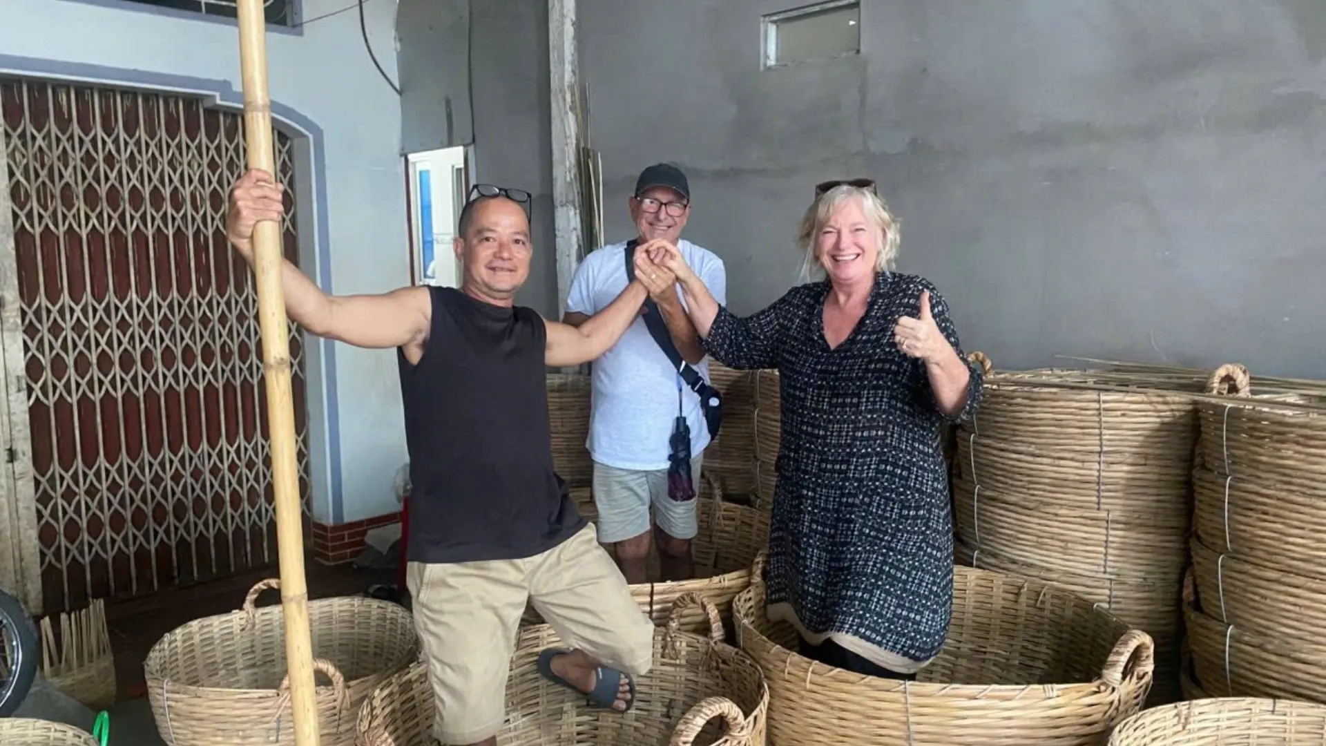 Bassac Cruise Mekong Delta guests experiencing traditional basket weaving