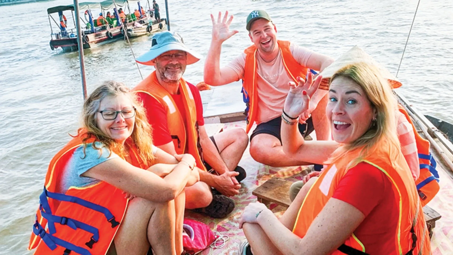 Bassac Cruise Mekong Delta guests exploring Cai Rang Floating Market