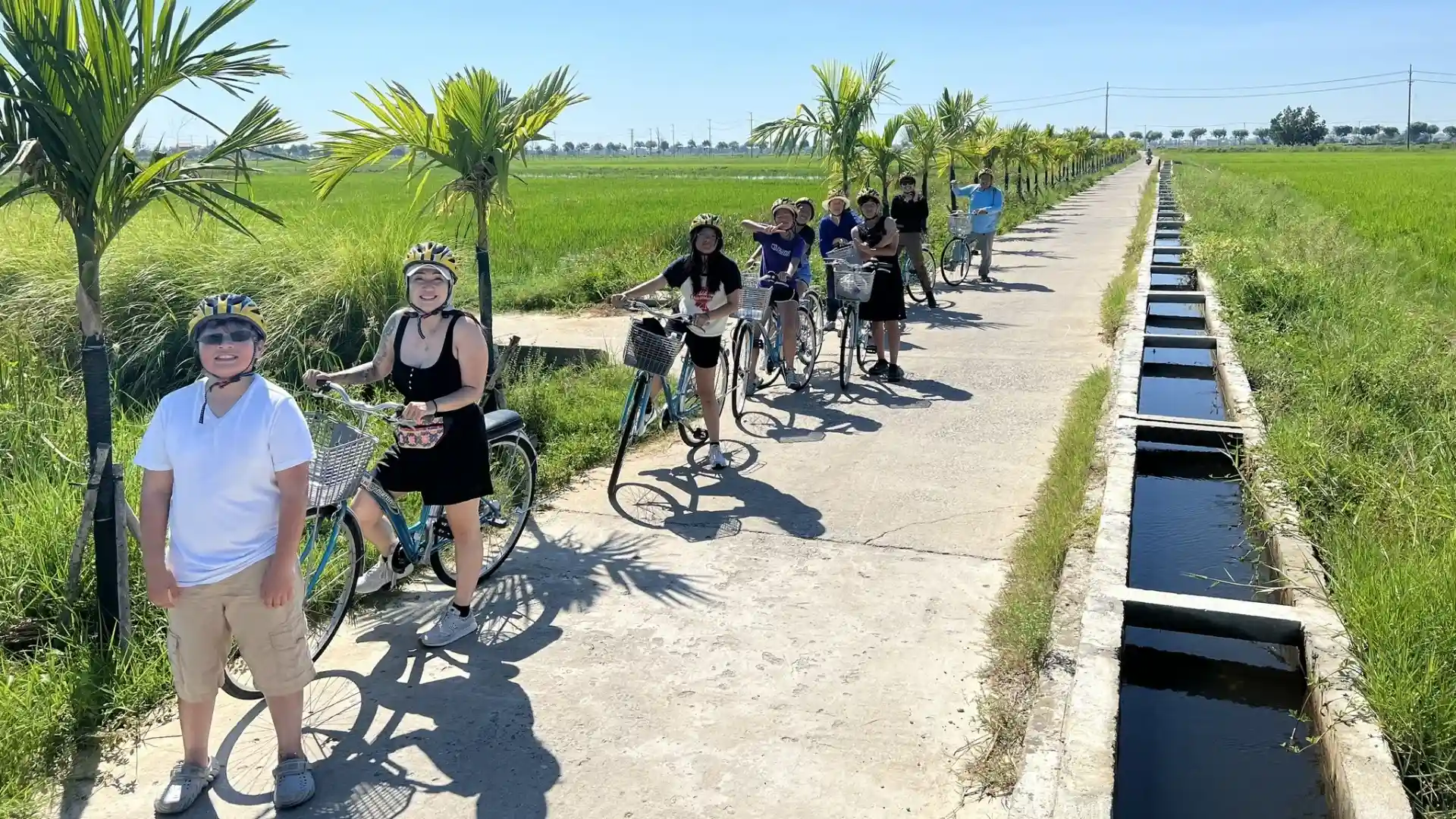 Bassac Cruise Mekong Delta guests cycling through local villages