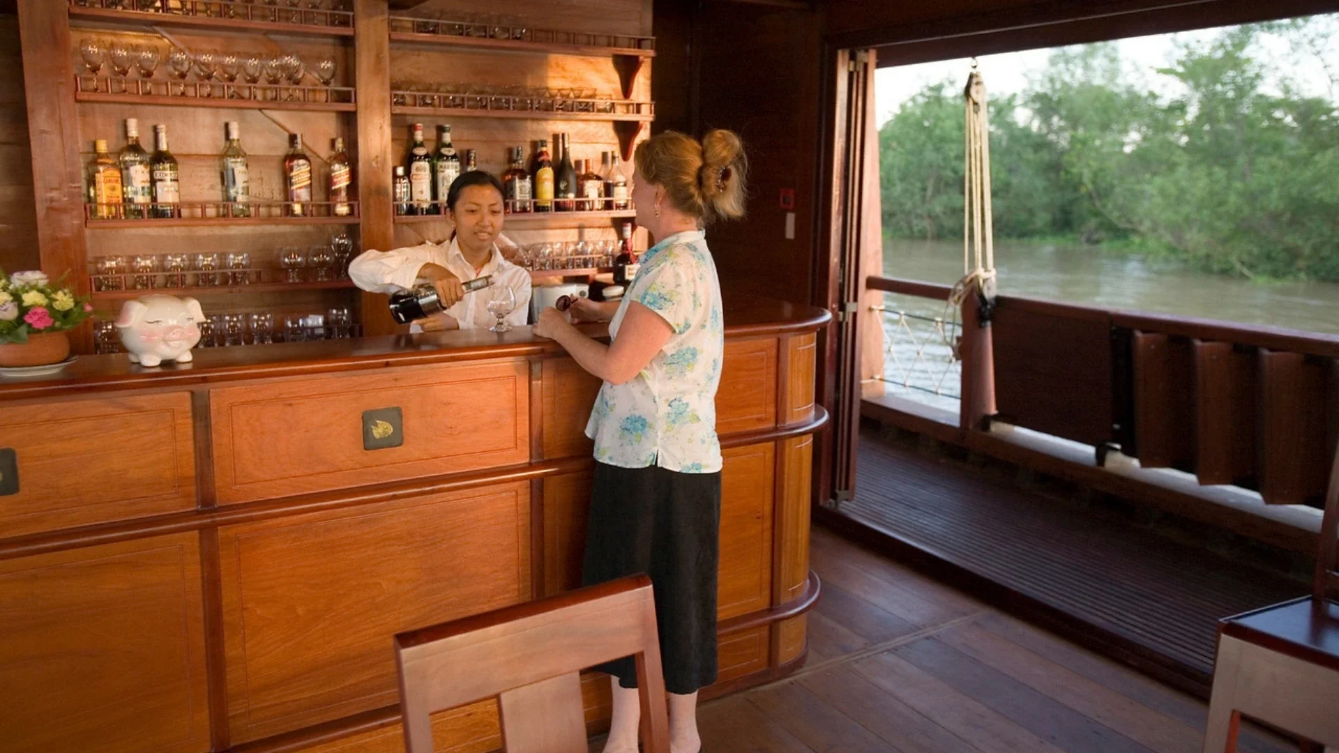 Bassac Cruise Mekong Delta guests relaxing at the bar