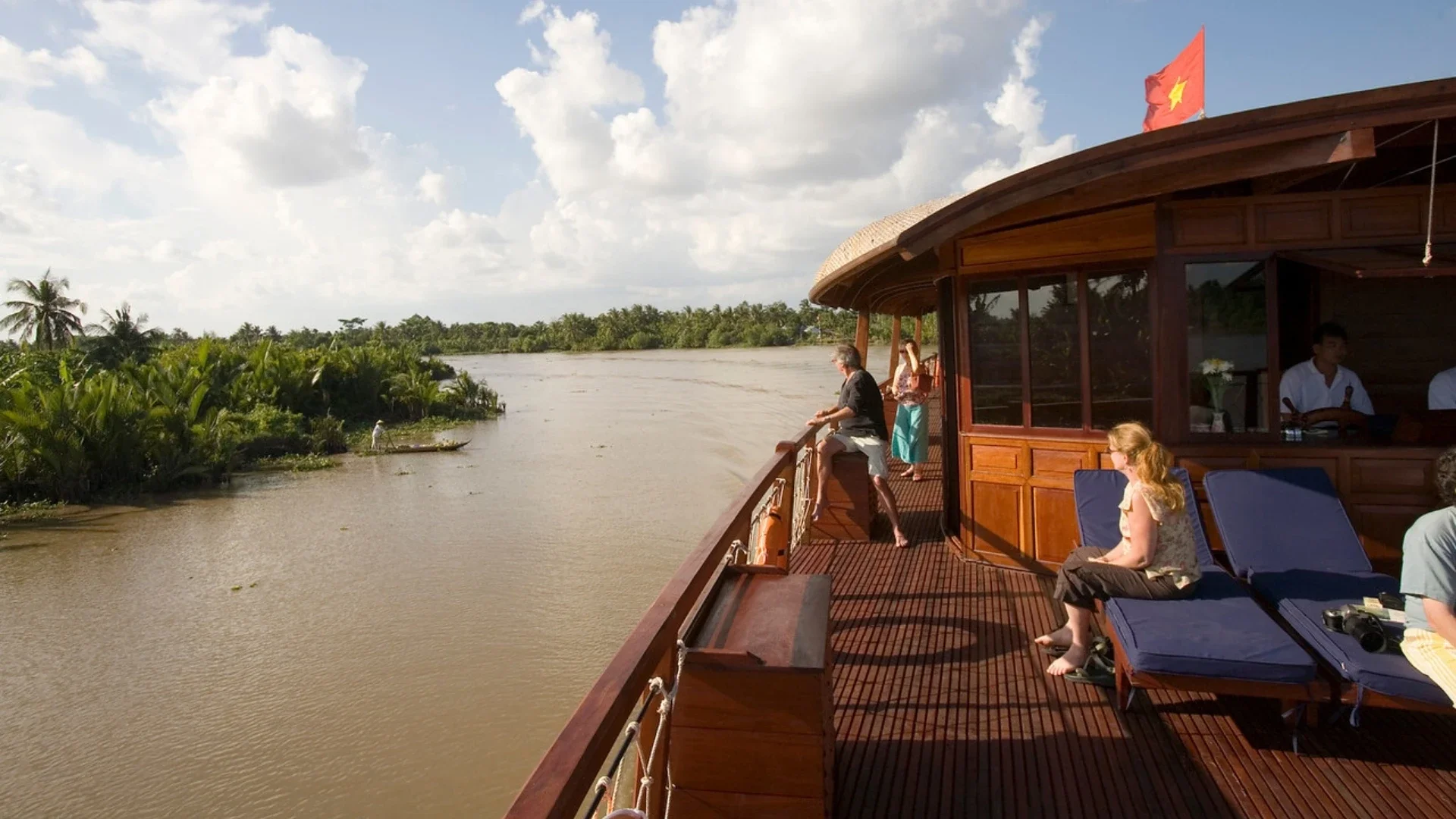Bassac Cruise Mekong Delta sunset scenery over calm river