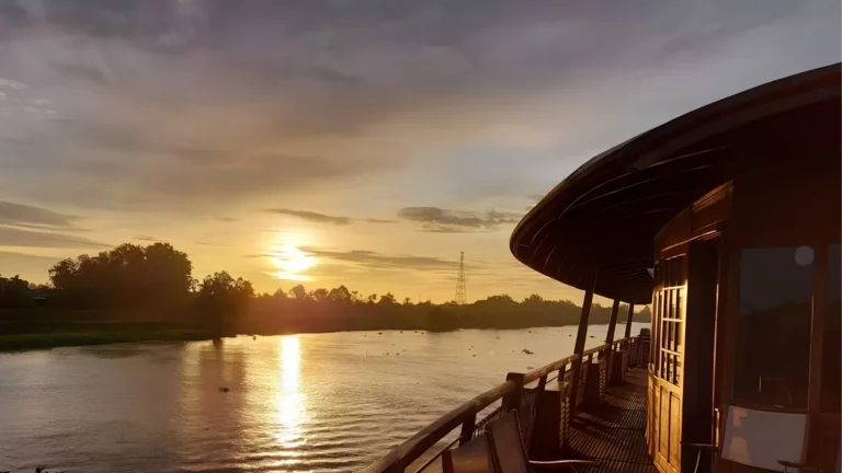 Bassac Cruise Mekong Delta sunset scenery over calm river