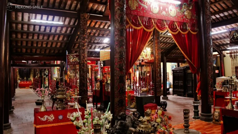 Admire the temple’s ceremonial hall with ornate carvings, incense altars, and sacred atmosphere
