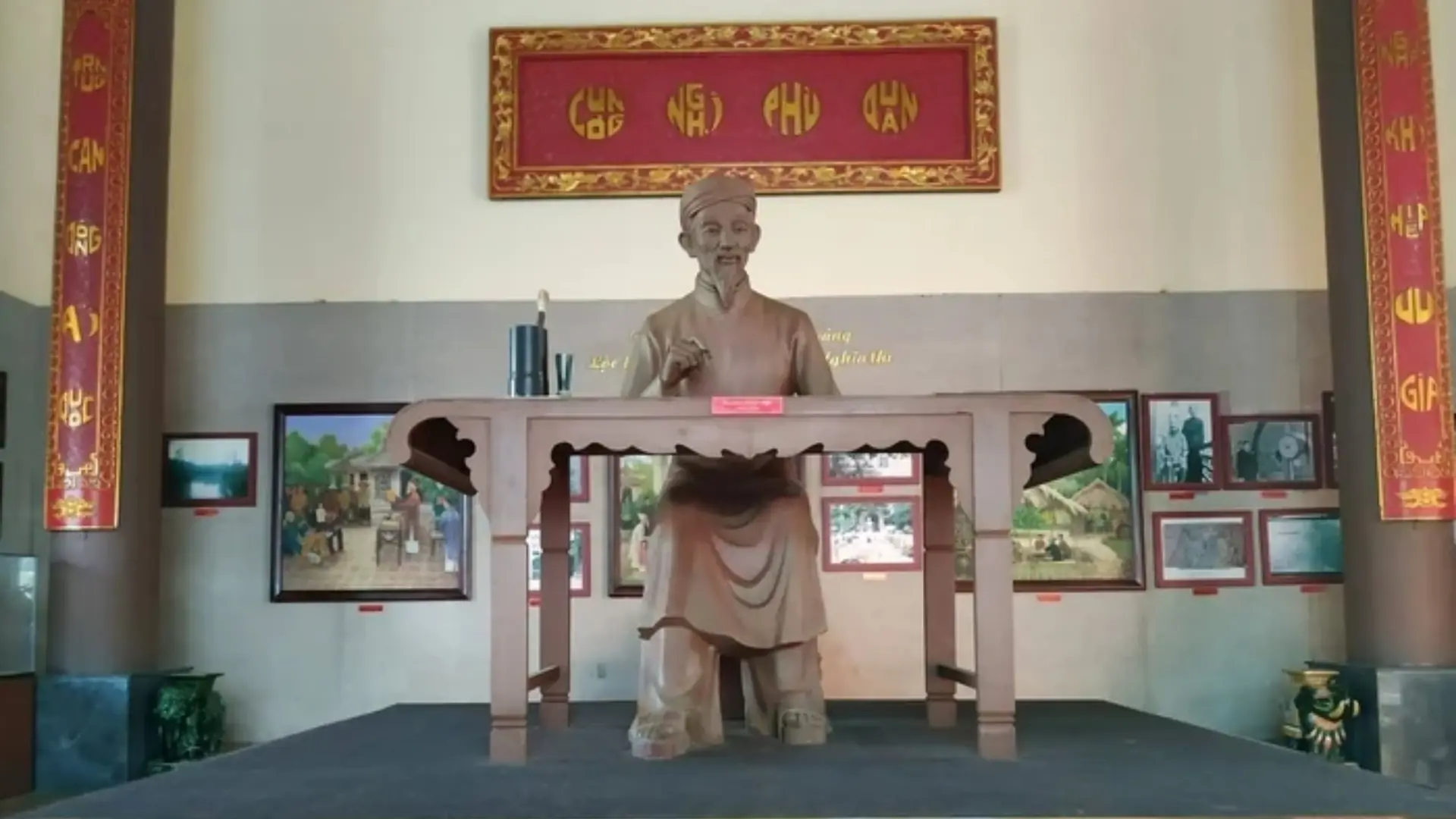 Bui Huu Nghia Memorial in Can Tho: Visitor Guide 279 Statue of Bùi Hữu Nghĩa seated at a writing desk inside the memorial