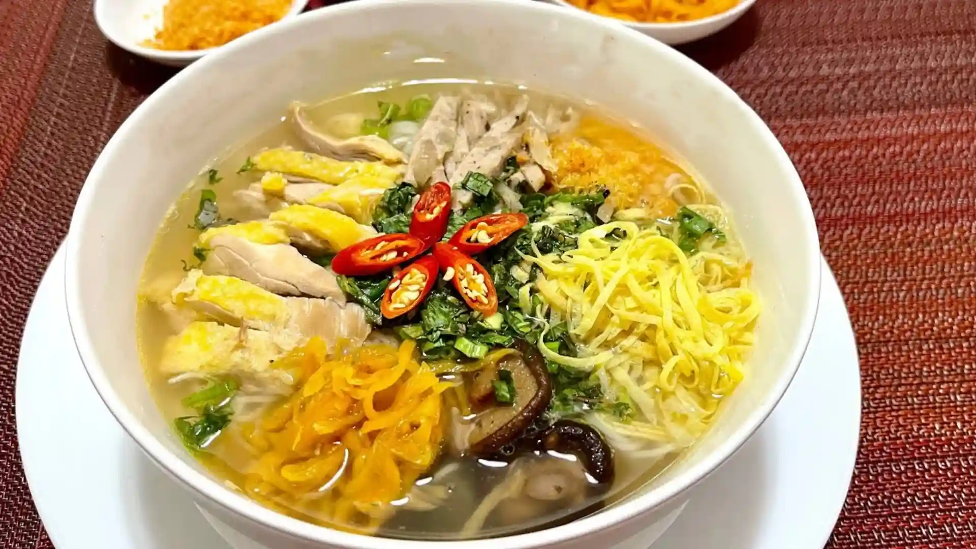 What to Eat in Vietnam: 30 Must-Try Dishes 84 Bún thang noodle soup topped with fine egg strips and herbs