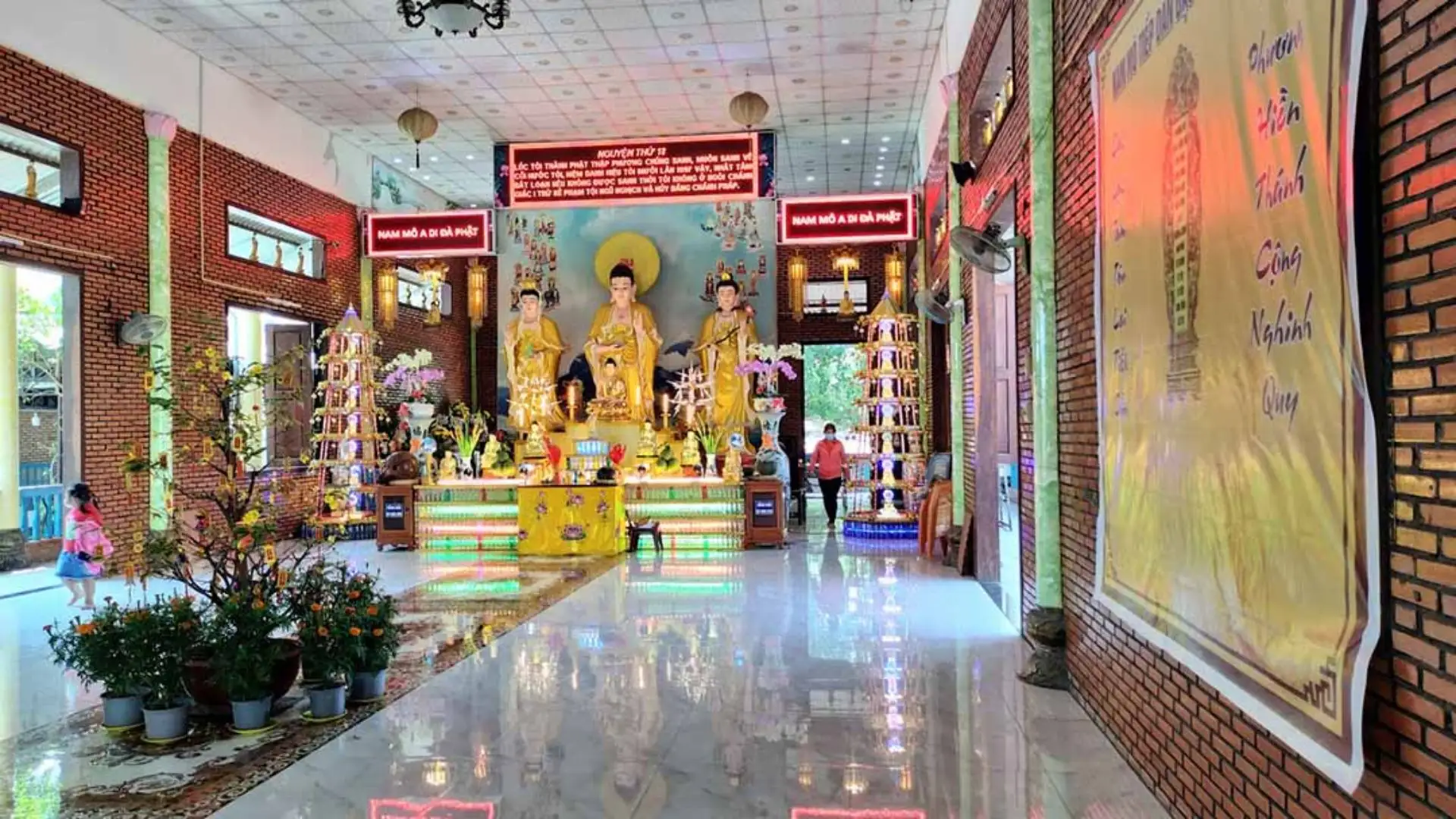 Brightly decorated ceremony hall at Buu Lam Pagoda