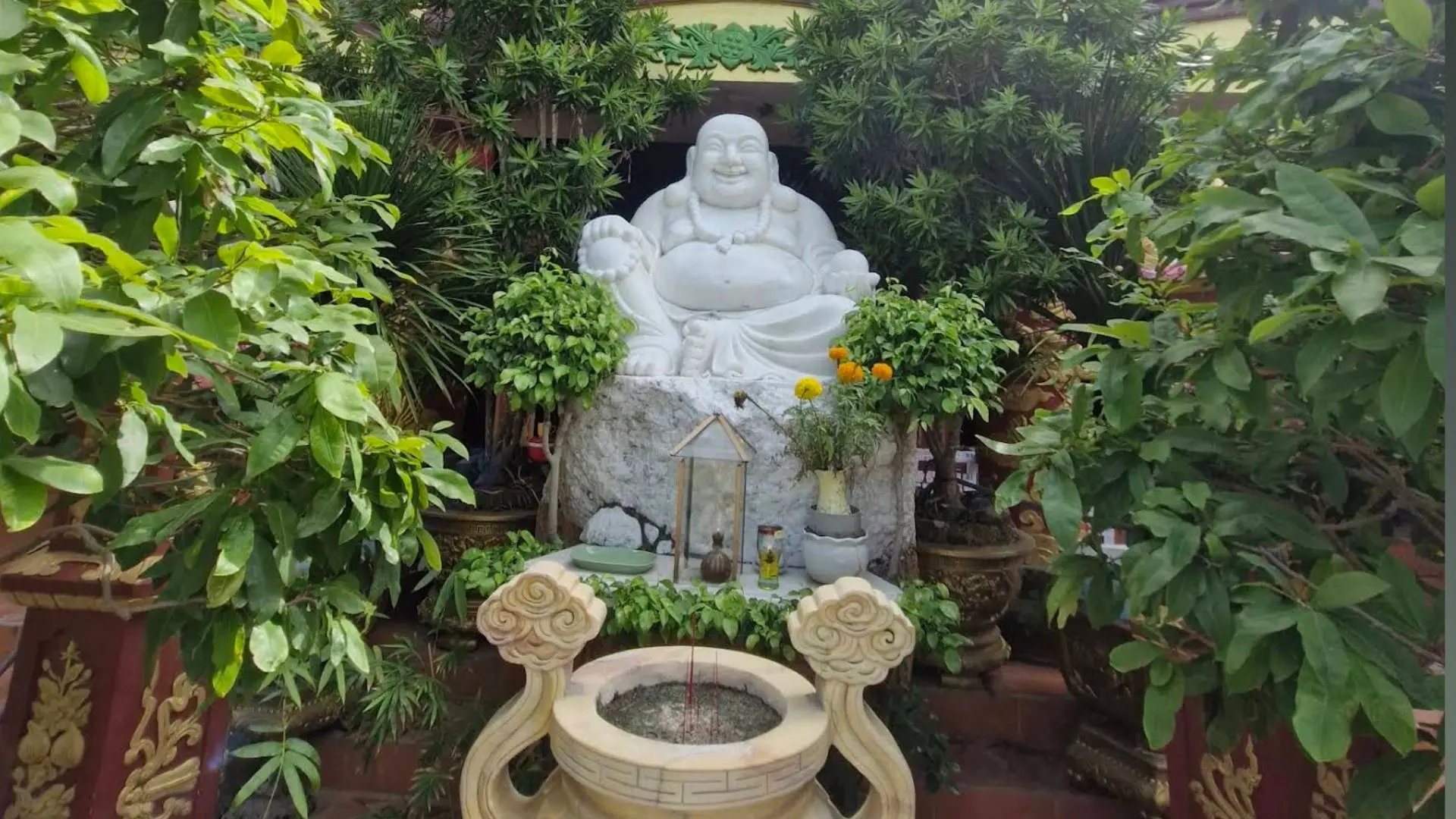 White stone Maitreya Buddha statue at Buu Lam Pagoda