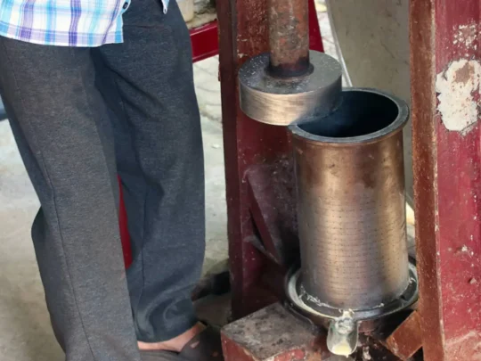 Traditional cacao processing equipment at a farm in Can Tho