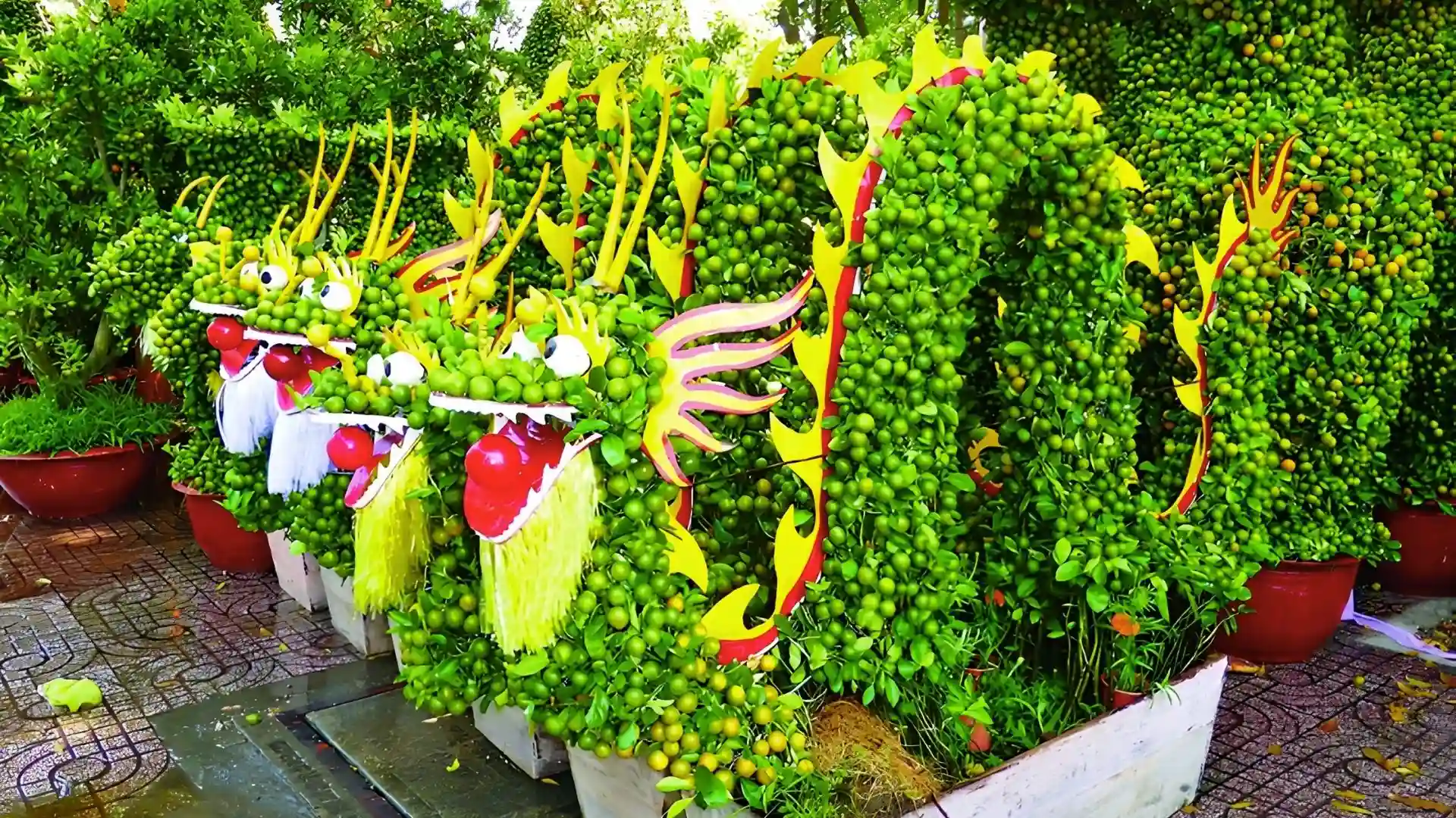 Decorative dragon-shaped shrubs and bonsai at Cai Mon Orchard Village