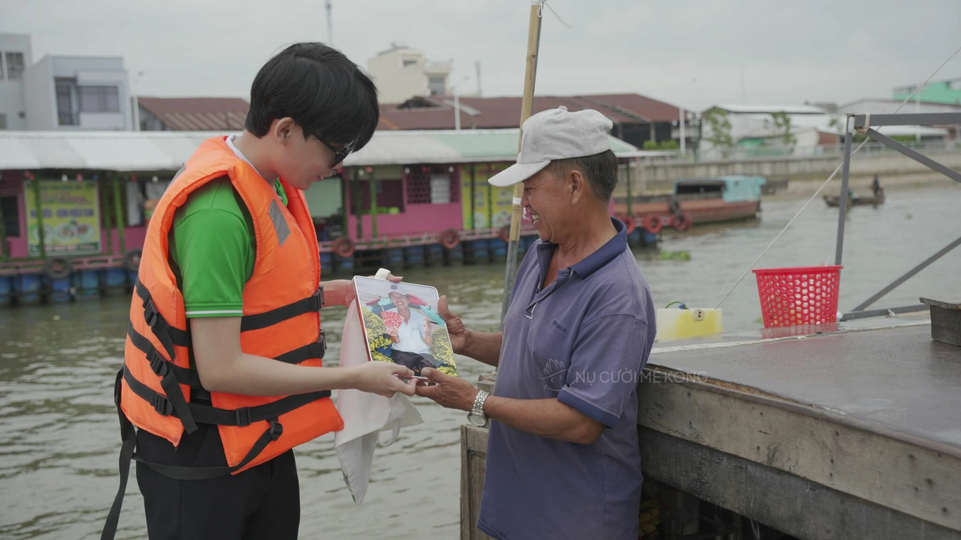 Mekong Smile team giving Tet gifts during Cai Rang Floating Market CSR campaign