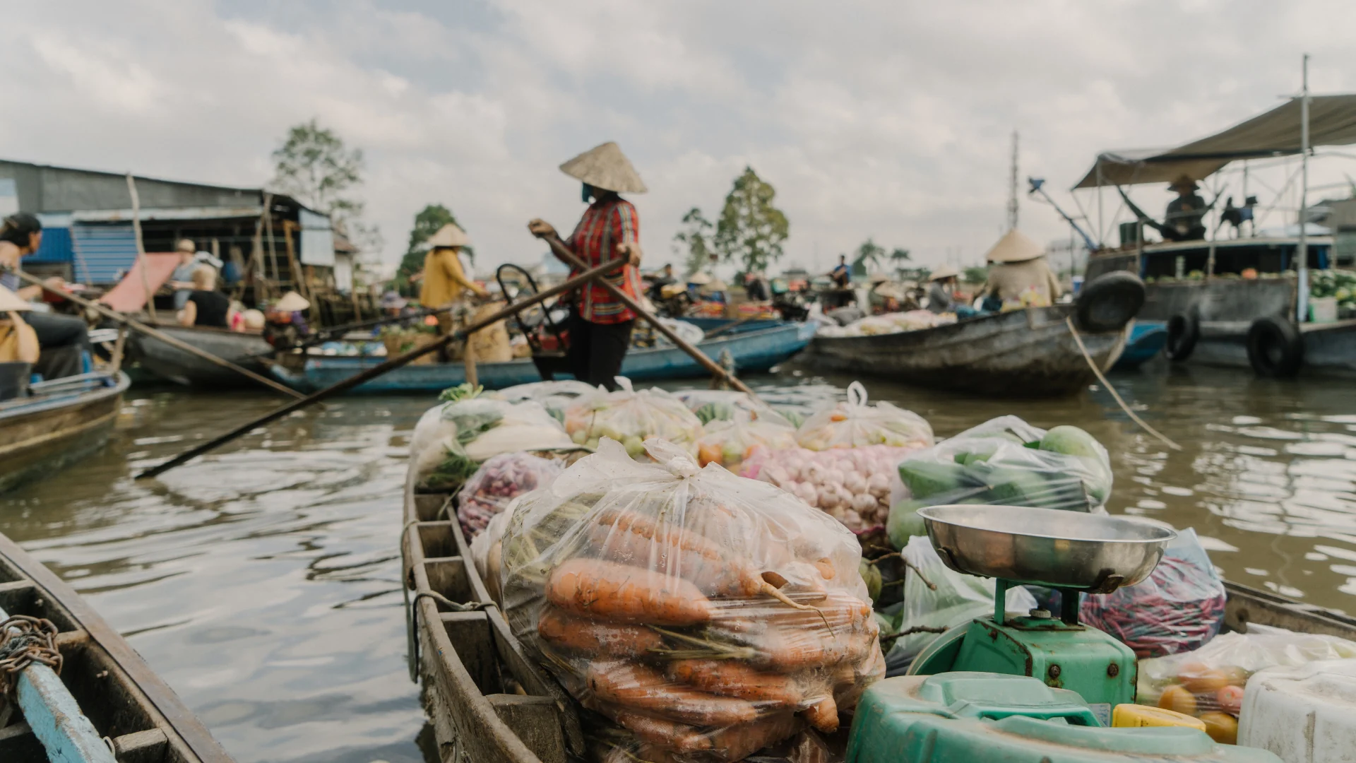 Boats trading fruits and goods at Cai Rang Floating Market in Can Tho