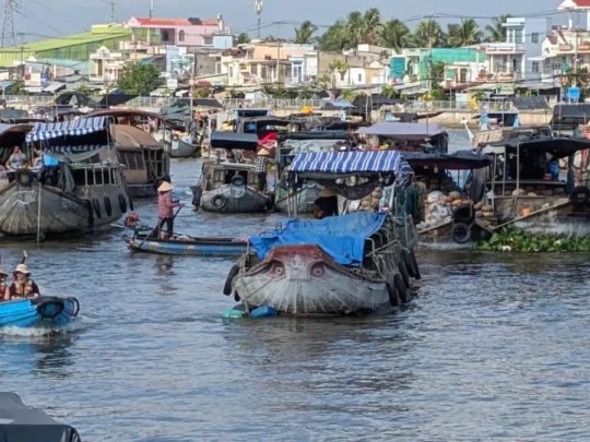 Trading boats gathered at Cai Rang Floating Market in Can Tho