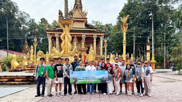 International travel partners visiting a local cultural site in Can Tho