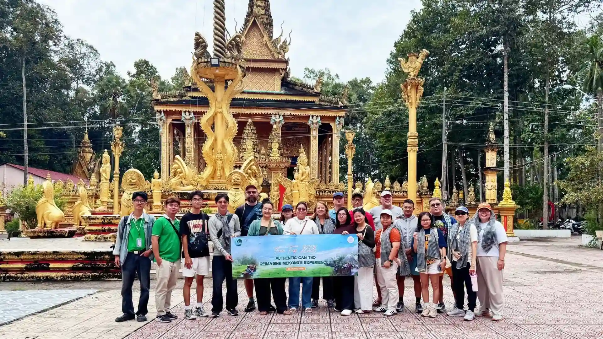 Can Tho Fam Trip 2026: Connecting International Travel Partners with Local Experiences 12 International travel partners visiting a local cultural site in Can Tho