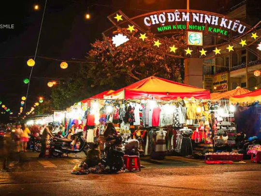 A shot capturing the vibrant lights and lively atmosphere of the Ninh Kieu night market at night