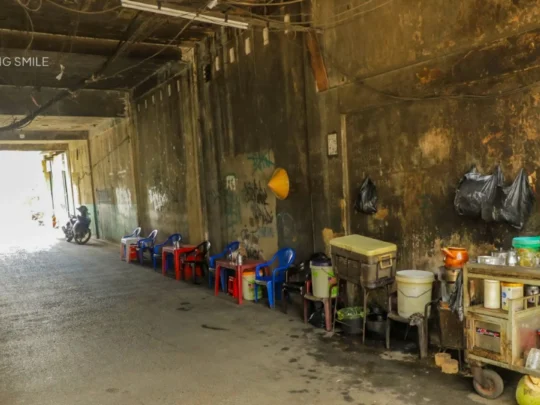A view of the bustling street life from a local coffee shop, showcasing the lively urban atmosphere