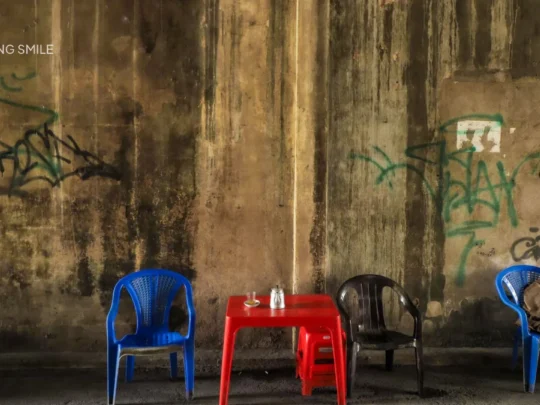 The iconic small plastic chairs of Vietnam, a symbol of the country's vibrant street food and coffee culture.