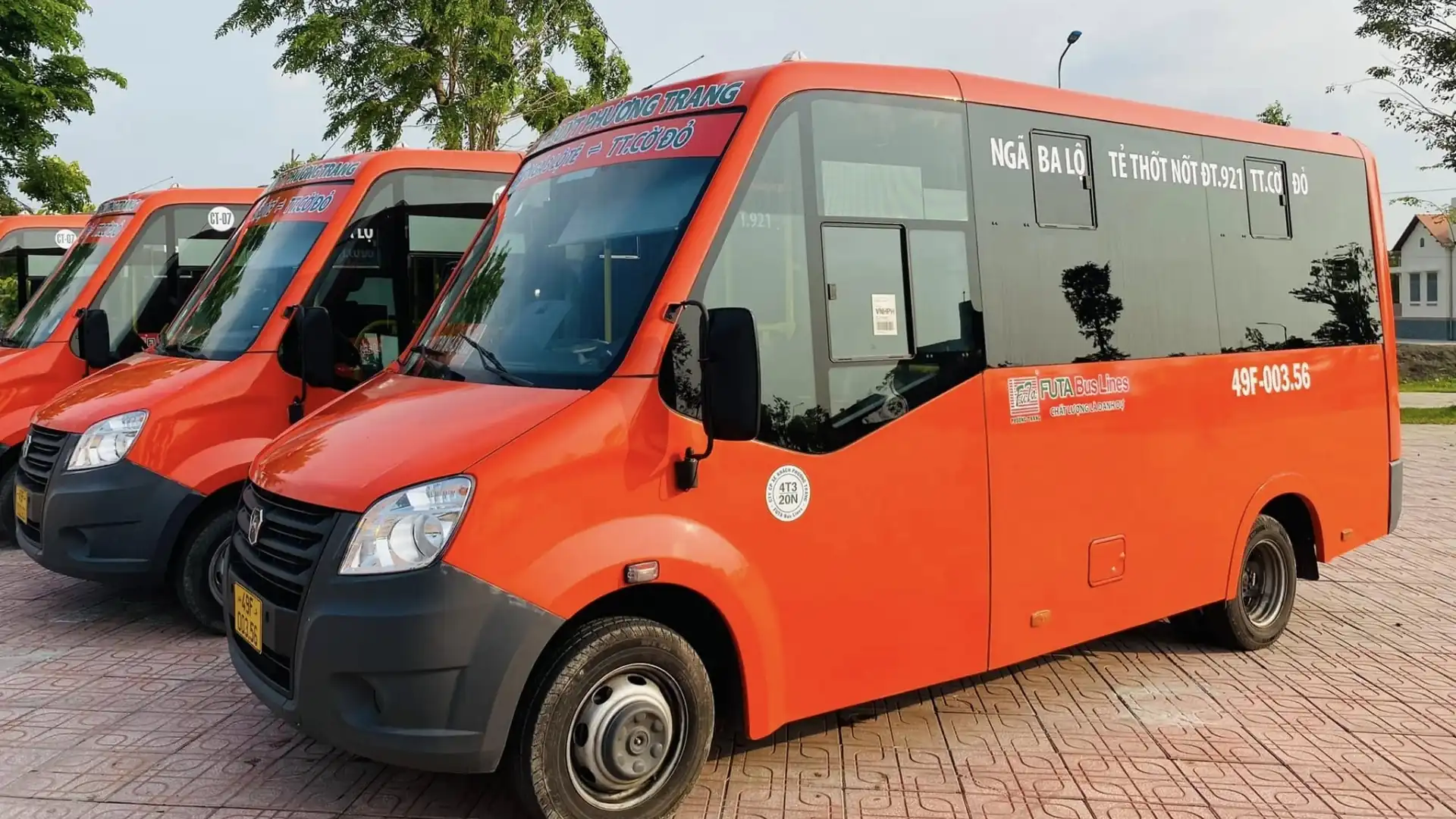 Can Tho International Airport (VCA): Flight & Travel Guide 378 Orange public minibuses parked together in Vietnam