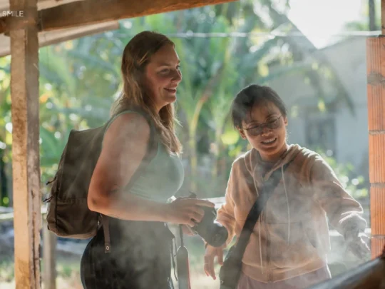 Local artisans demonstrating the process of making rice noodles at a family-run workshop in Can Tho