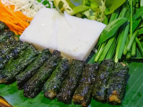 Vegetarian "Bo La Lot" served with fresh herbs and a special dipping sauce, a complete traditional dish