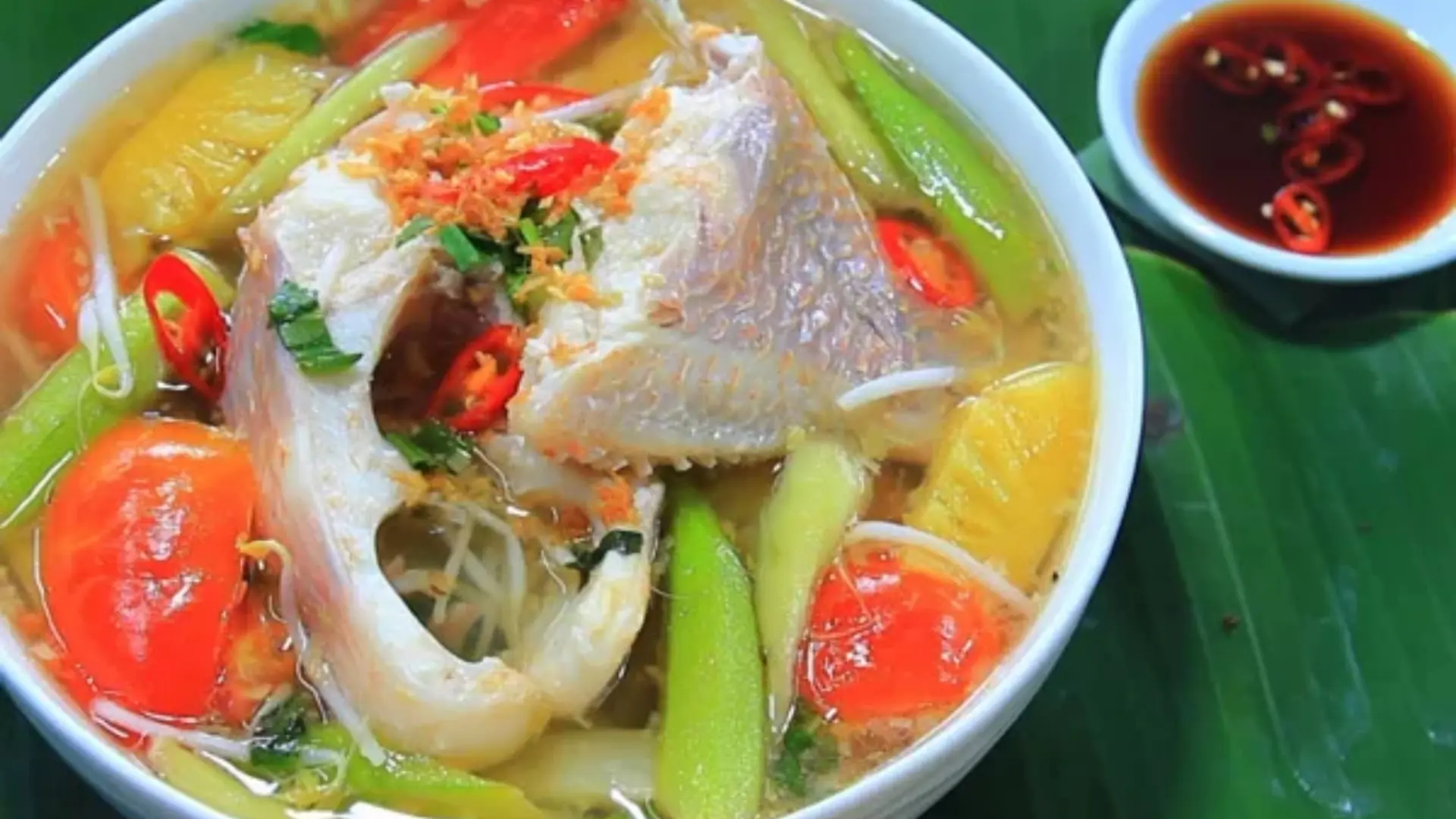 What to Eat in Vietnam: 30 Must-Try Dishes 98 Vietnamese canh chua sweet-and-sour fish soup with vegetables