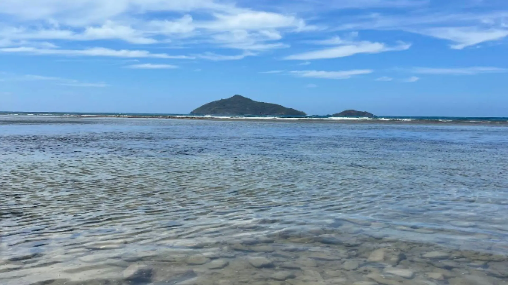 Clear shallow water and coastal scenery at Ong Cau Beach Con Dao Island