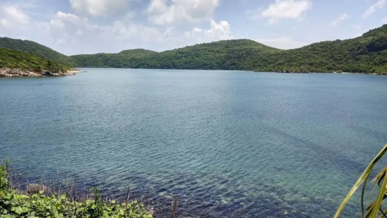 Clear water and green hills at Bamboo Lagoon during the Con Dao forest and sea tour