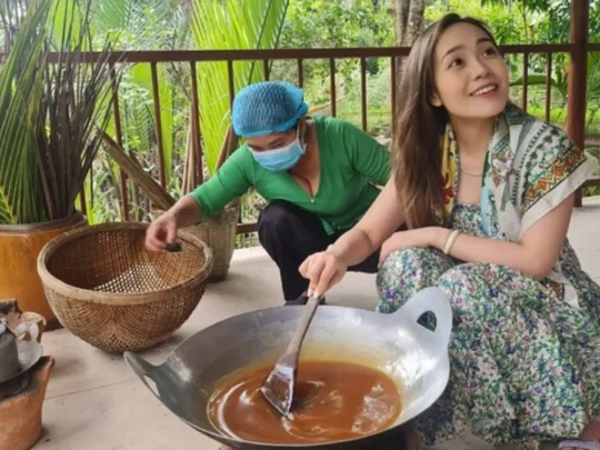 Traditional process of making coconut candy in Ben Tre Vietnam