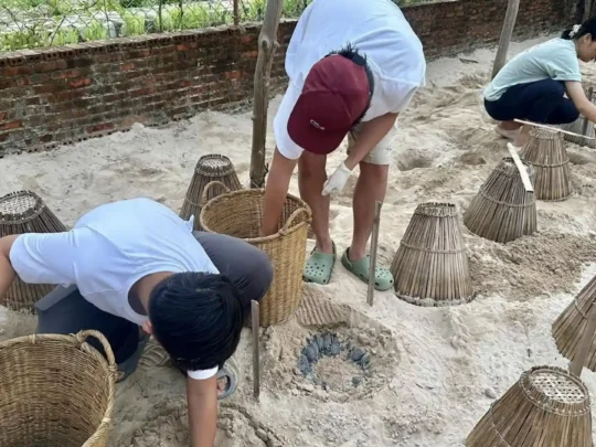 Park staff checking turtle nests at a Con Dao sea turtle hatchery
