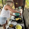 Travelers try to make the Vietnamese Pizza-Con Son Islet