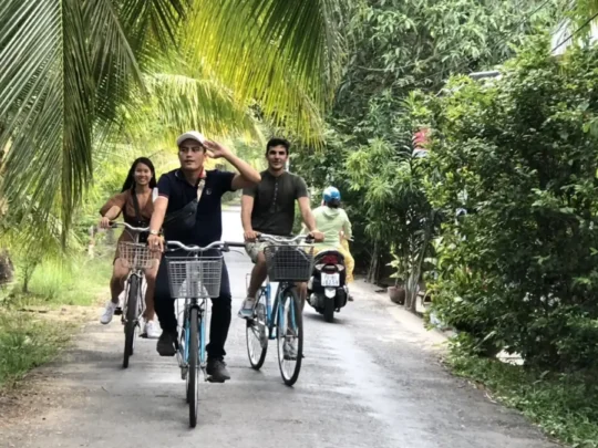 Cycling through local Mekong Delta villages and fruit gardens
