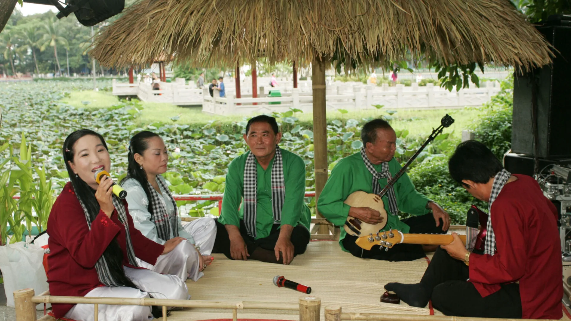 Artists performing traditional Don Ca Tai Tu music on the Mekong River