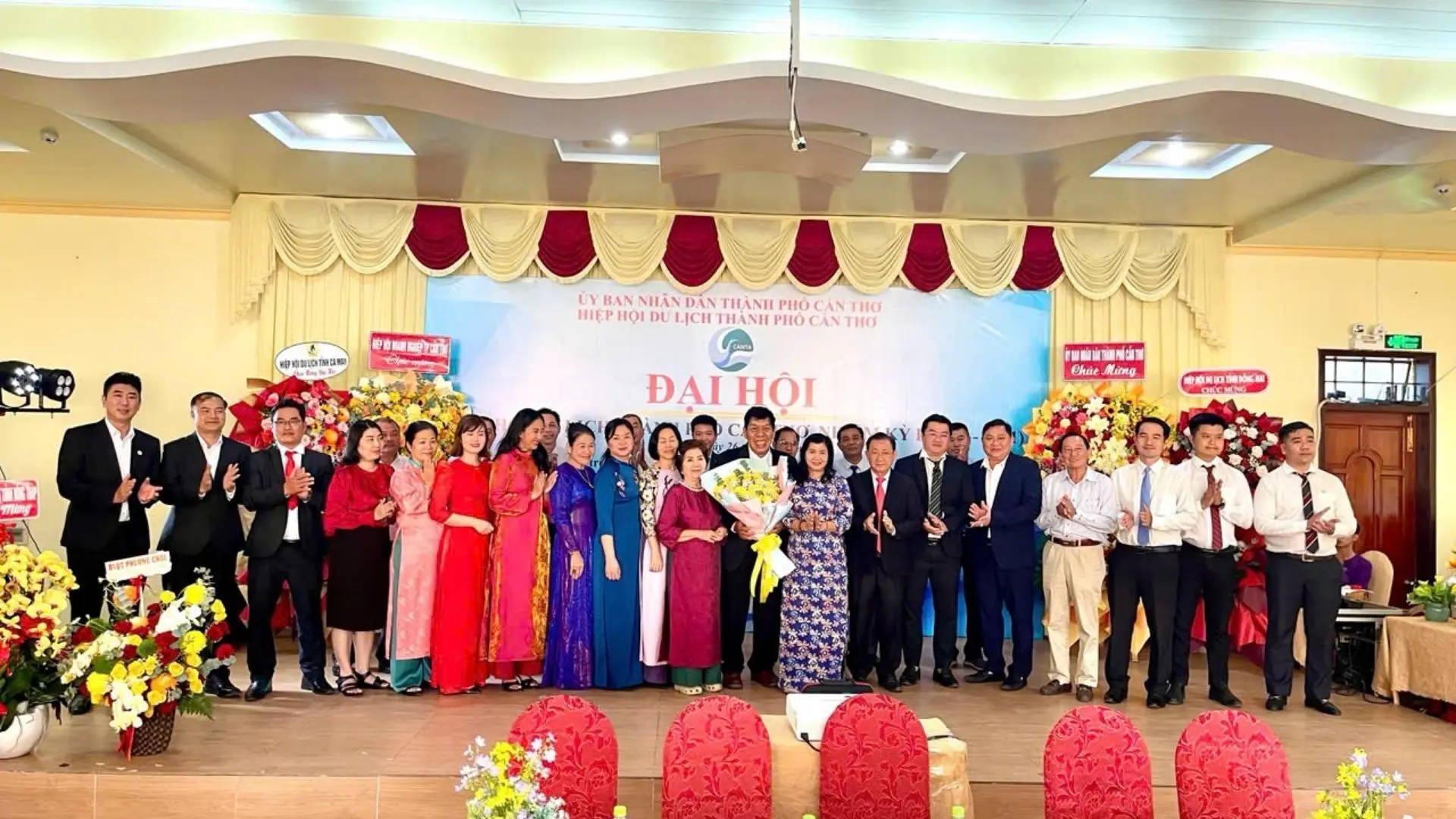 The newly inaugurated Executive Board of the Can Tho Tourism Association, including Mekong Smile members, on stage in Can Tho