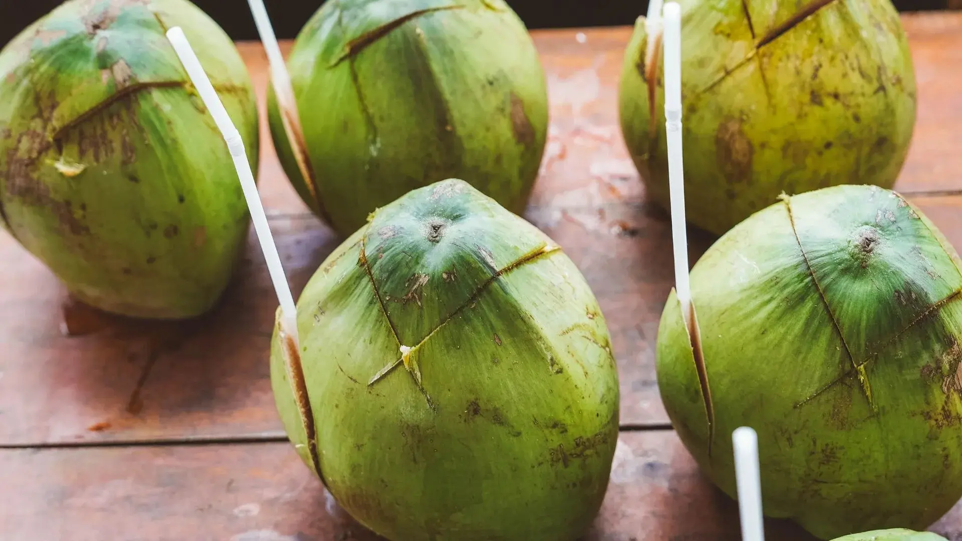 Fresh green coconuts served during the Ben Tre tour