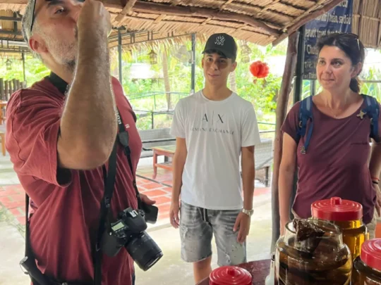 Guests visiting a local stop during the Ben Tre tour