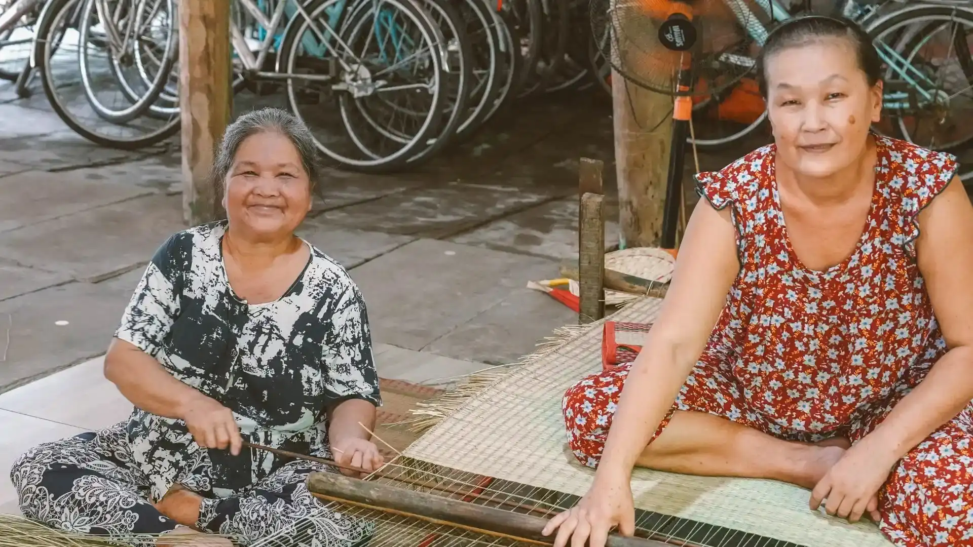 Local artisans weaving traditional sleeping mats in Nhon Thanh, Ben Tre
