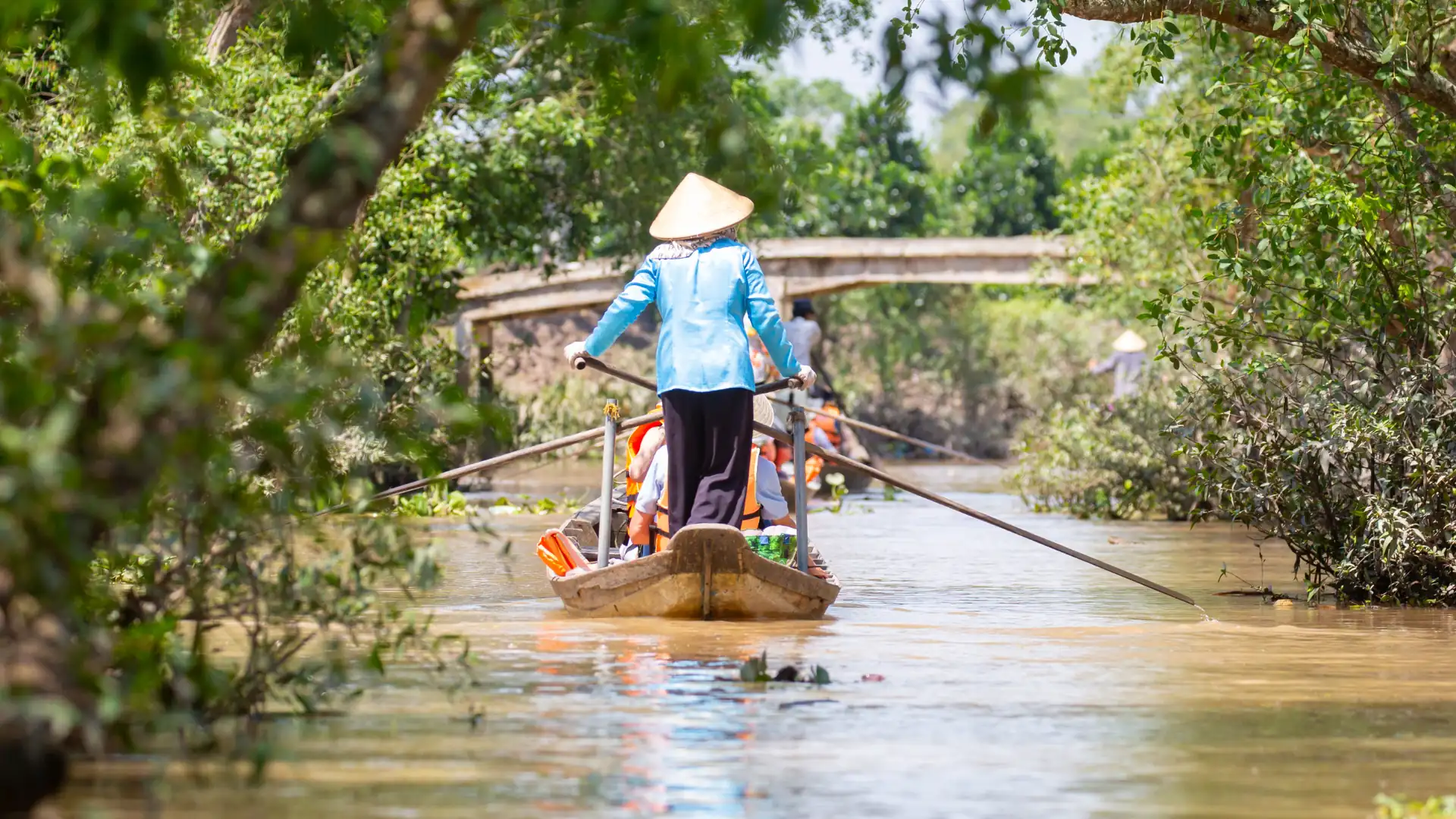 Smiling Mekong Delta locals welcoming visitors with warmth