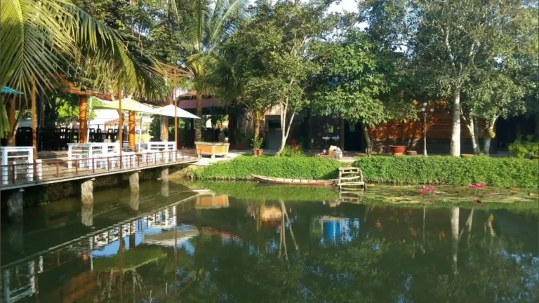 Peaceful garden and pond scenery at Bao Gia Trang Vien Ecological Village in Can Tho