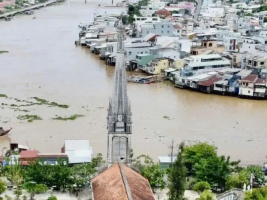 High-angle view of Cai Be town and the river from above