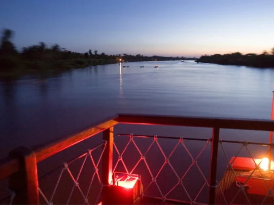 Mekong Smile Bassac Cruise Cai Be Can Tho evening river scenery from deck